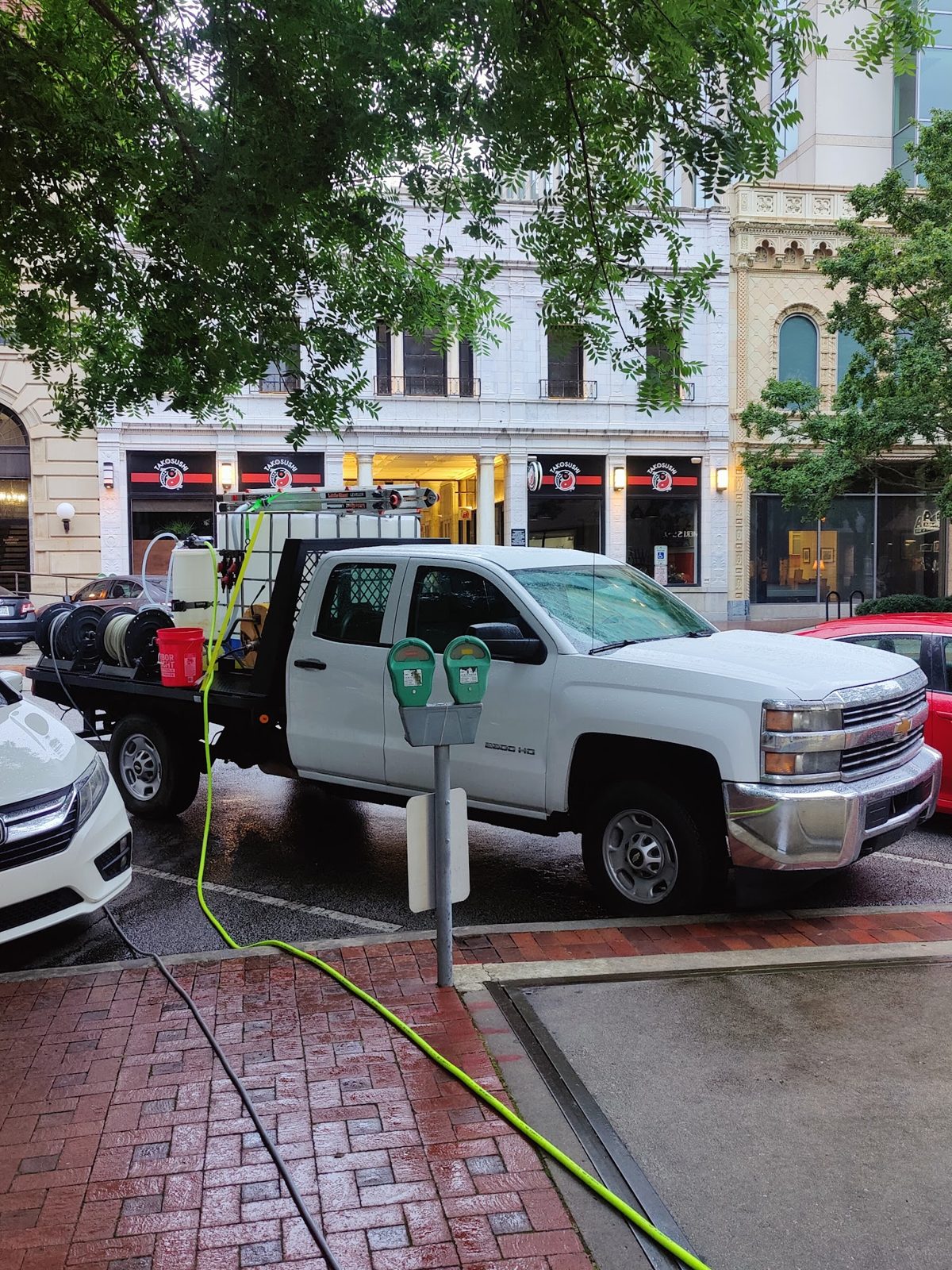 A commercial building front before and after a Soda City wash