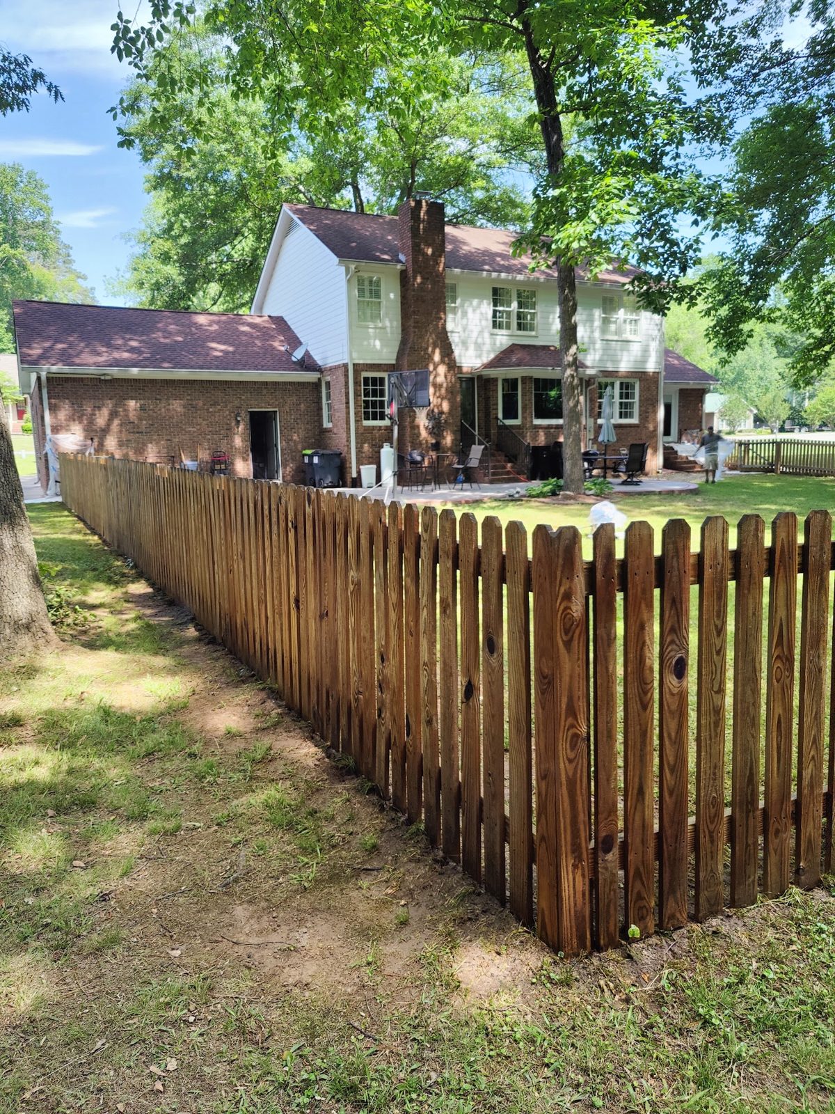 A wood deck or fence before and after a Soda City clean and brighten