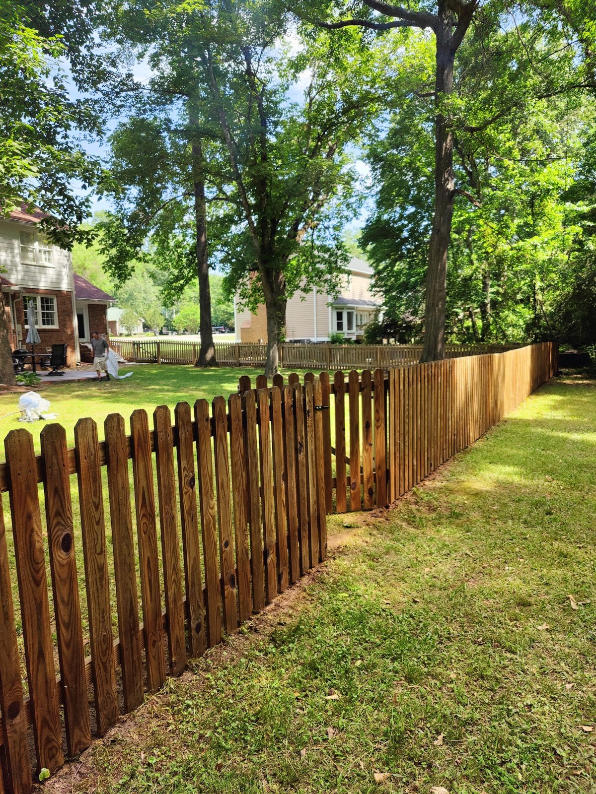 A wood deck or fence before and after a Soda City clean and brighten